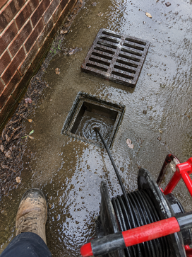 Spot liner installed in storm drain pipe at targeted defect location — no full-run lining required.