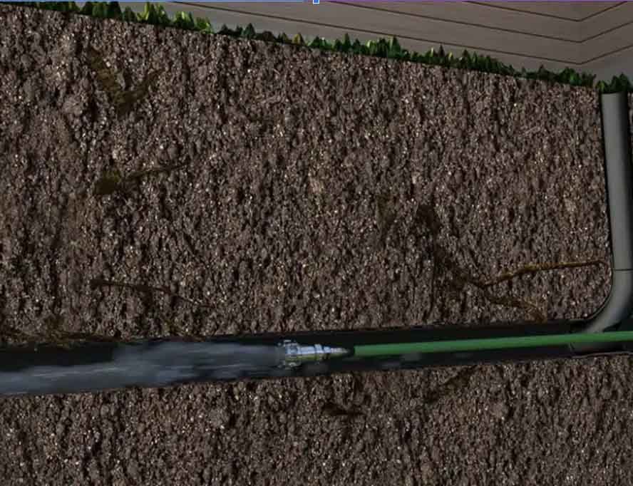 LiningWorks hydro jetting an underground sewer line to clear tree root intrusion.