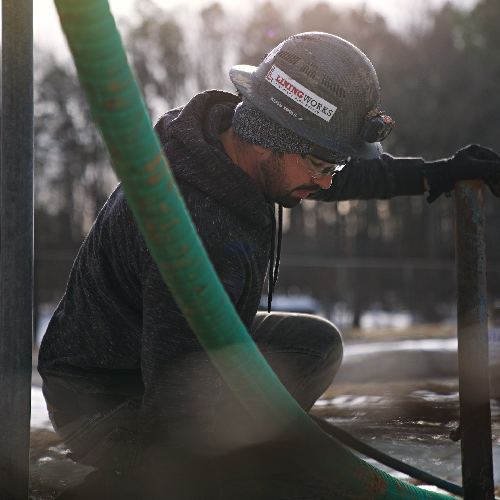 LiningWorks technician working on site in China Grove, NC, ahead of a commercial hydro jetting service.