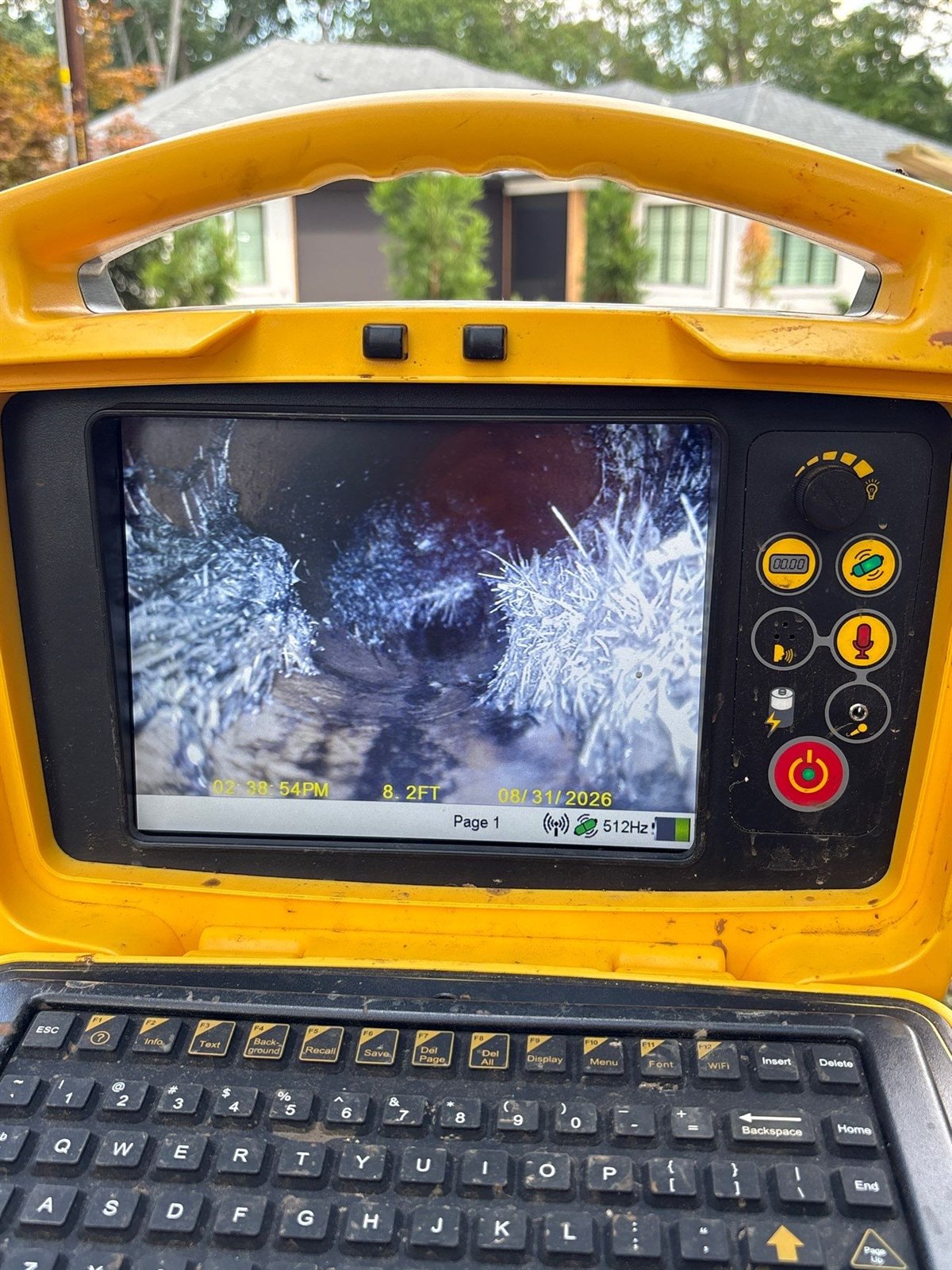 Sewer camera inspection revealing severe root intrusion inside a sewer line before a backup occurs.