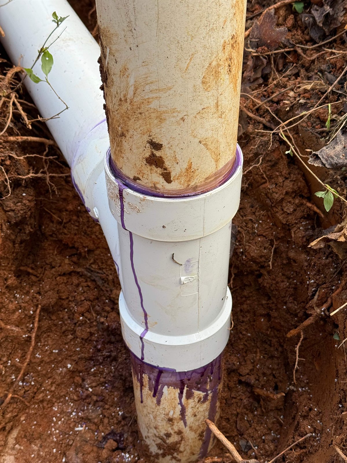 After: a repaired underground PVC sewer pipe joint sealing the leak LiningWorks found on camera.